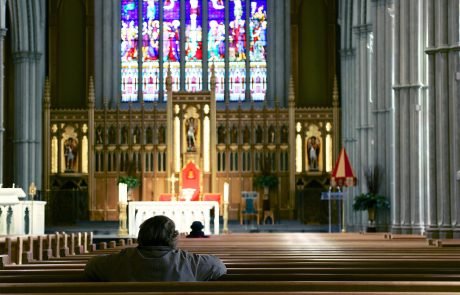 Parishioner worshipping in the Cathedral